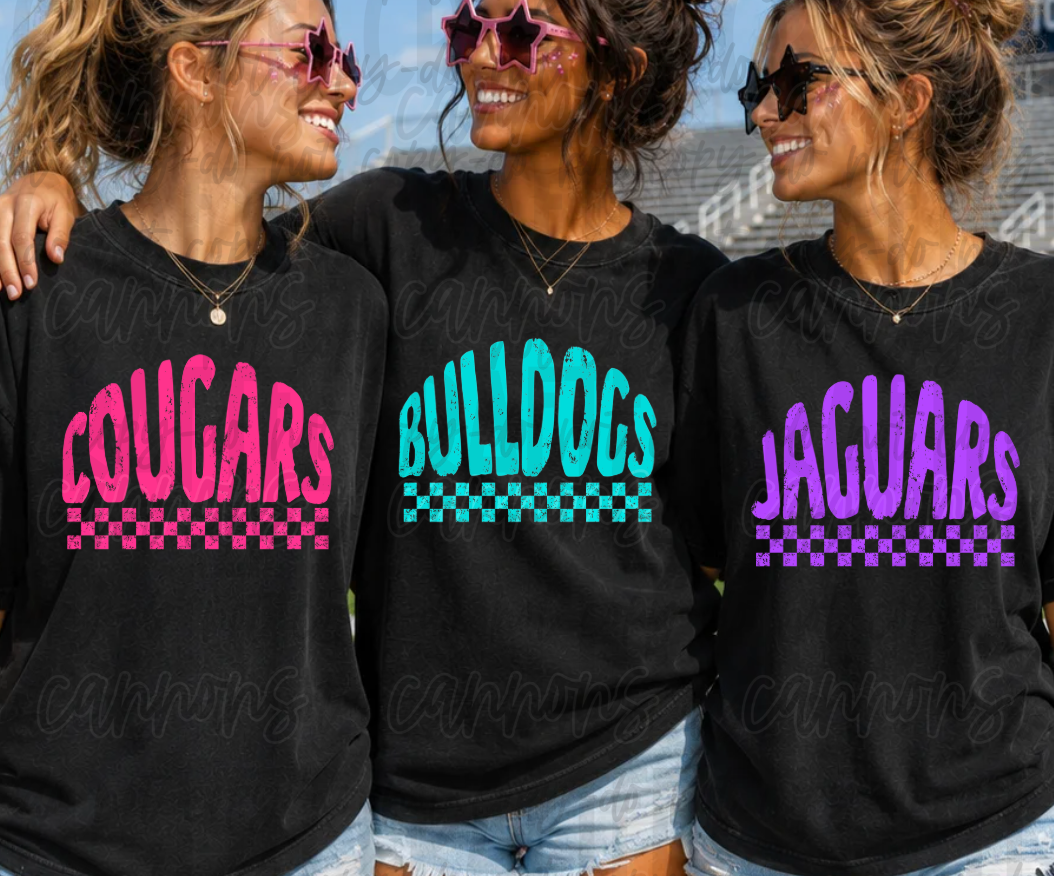 Three women wearing custom mascot checkerboard spirit sweatshirts in Cougars, Bulldogs, and Jaguars designs